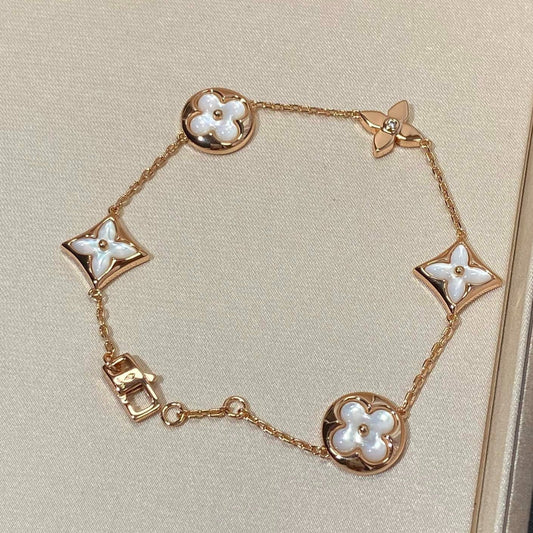 [Luxe]STAR AND SUN 5 MOTIF MOP PINK GOLD BRACELET