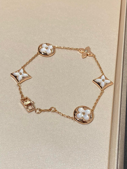 [LUXE]STAR AND SUN 5 MOTIF MOP PINK GOLD ARMBAND
