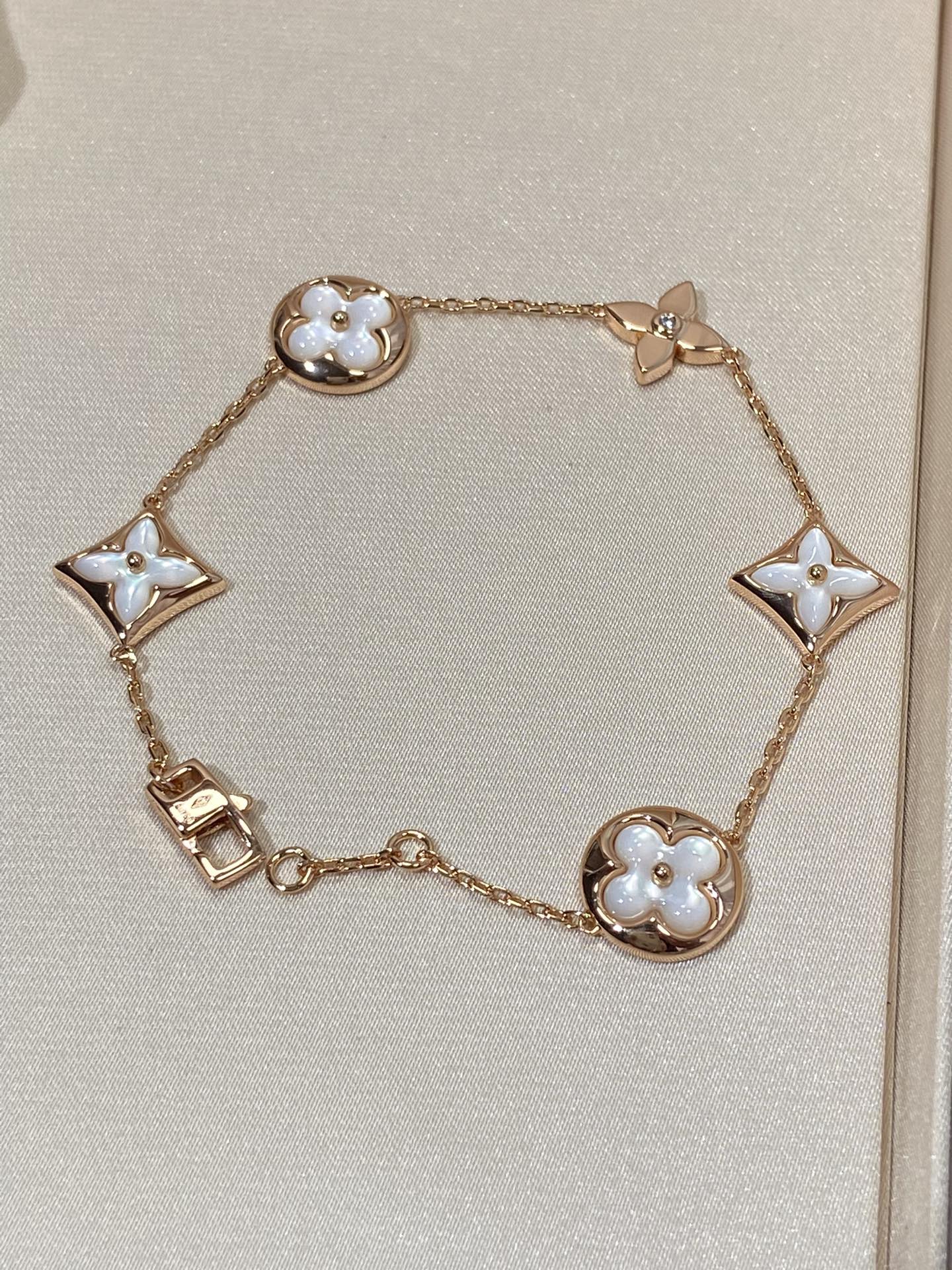 [Luxe]STAR AND SUN 5 MOTIF MOP PINK GOLD BRACELET