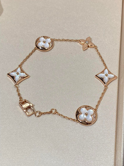 [LUXE]STAR AND SUN 5 MOTIF MOP PINK GOLD ARMBAND