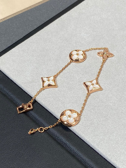 [LUXE]STAR AND SUN 5 MOTIF MOP PINK GOLD ARMBAND