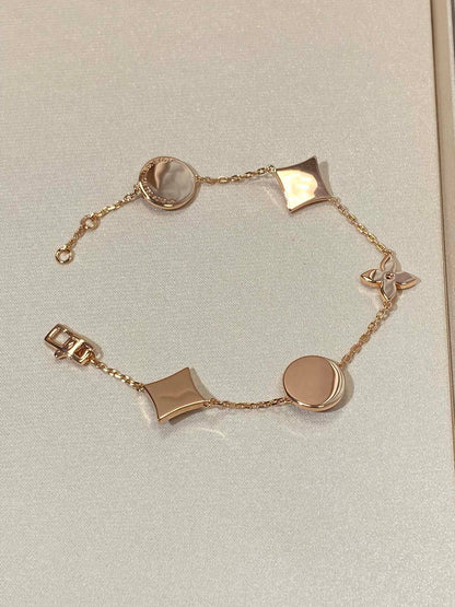 [LUXE]STAR AND SUN 5 MOTIF MOP PINK GOLD ARMBAND