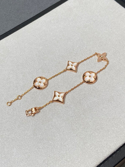 [LUXE]STAR AND SUN 5 MOTIF MOP PINK GOLD ARMBAND