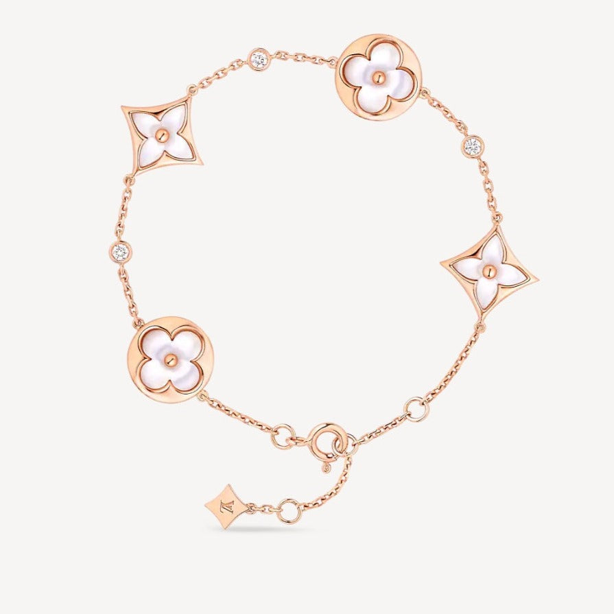 [Luxe]STAR AND SUN 4 MOTIF WHITE MOP PINK GOLD BRACELET